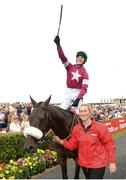 27 July 2016; Donagh Meyler celebrates as he enters the winner's enclosure on Lord Scoundrel after the TheTote.com Galway Plate Steeplechase Handicap at the Galway Races in Ballybrit, Co Galway. Photo by Cody Glenn/Sportsfile