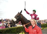 27 July 2016; Donagh Meyler celebrates as he enters the winner's enclosure on Lord Scoundrel after the TheTote.com Galway Plate Steeplechase Handicap at the Galway Races in Ballybrit, Co Galway. Photo by Cody Glenn/Sportsfile