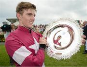 27 July 2016; Donagh Meyler celebrates with the Galway Plate after winning the TheTote.com Galway Plate Steeplechase Handicap at the Galway Races in Ballybrit, Co Galway. Photo by Cody Glenn/Sportsfile
