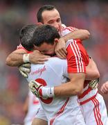 19 September 2010; Cork goalkeeper Alan Quirke, right, celebrates with team-mates Graham Canty, left, and Kieran O'Connor at the end of the game. GAA Football All-Ireland Senior Championship Final, Down v Cork, Croke Park, Dublin. Picture credit: David Maher / SPORTSFILE