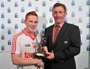 19 September 2010; John McCullagh, Tyrone, is presented with the Man of the Match by Ambrose O'Donovan, of ESB, after the game. ESB GAA Football All-Ireland Minor Championship Final, Cork v Tyrone, Croke Park, Dublin. Picture credit: Brendan Moran / SPORTSFILE