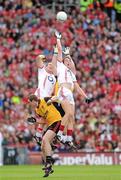 19 September 2010; The four midfield players, Alan O'Connor and Aidan Walsh, right, Cork, and Peter Fitzpatrick, left, and Kalum King, all jump for a dropping ball. GAA Football All-Ireland Senior Championship Final, Down v Cork, Croke Park, Dublin. Picture credit: Ray McManus / SPORTSFILE