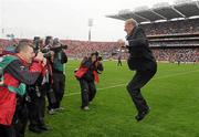 19 September 2010; RTE Gaelic Games Commentator Micheal O Muircheartaigh jumps for photographers prior to commentating on his last All-Ireland Senior Championship Final. GAA Football All-Ireland Senior Championship Final, Down v Cork, Croke Park, Dublin. Photo by Sportsfile