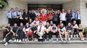 20 September 2010; Staff of Our Lady's Hospital for Sick Children and members of An Garda Síochána join Cork players and mentors with the Sam Maguire cup during a team visit to Our Lady's Hospital for Sick Children, Crumlin, Dublin. Picture credit: Barry Cregg / SPORTSFILE