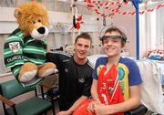 20 September 2010; Cork player Eoin Cadogan with Antoine Hennigan, aged 14, from Douglas, Co. Cork, during a team visit to Our Lady's Hospital for Sick Children, Crumlin, Dublin. Picture credit: Barry Cregg / SPORTSFILE