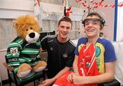 20 September 2010; Cork player Eoin Cadogan with Antoine Hennigan, aged 14, from Douglas, Co. Cork, during a team visit to Our Lady's Hospital for Sick Children, Crumlin, Dublin. Picture credit: Barry Cregg / SPORTSFILE