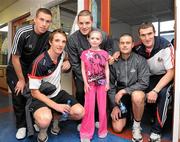 20 September 2010; Cork players, from left to right, Patrick Kelly, Aidan Walsh, Daniel Goulding, Patrick O' Shea, and Graham Canty with Ciara Murray, aged 7, from Letterkenny, Co. Donegal, during a team visit to Our Lady's Hospital for Sick Children, Crumlin, Dublin. Picture credit: Barry Cregg / SPORTSFILE
