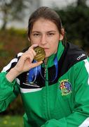 20 September 2010; Three time World Women's Boxing Champion Katie Taylor on her return home from the AIBA Women World Boxing Championships, in Barbados, where she retained her 60kg Lightweight division crown. Dublin Airport, Dublin. Photo by Sportsfile