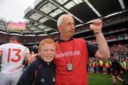 19 September 2010; Cork manager Conor Counihan celebrates with his son Oisin, aged 9, after the game. GAA Football All-Ireland Senior Championship Final, Down v Cork, Croke Park, Dublin. Photo by Sportsfile