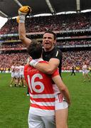 19 September 2010; Cork goalkeeper Alan Quirke celebrates with reserve goalkeeper Paddy O'Shea after the game. GAA Football All-Ireland Senior Championship Final, Down v Cork, Croke Park, Dublin. Picture credit: Oliver McVeigh / SPORTSFILE