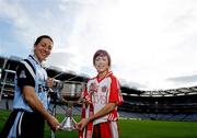 21 September 2010; Competing captains gathered at Croke Park ahead of the TG4 Ladies Football All Ireland finals. The Senior, Intermediate and Junior Championship finals will take place at Croke Park on Sunday 26th of September. Pictured are the Senior captains Denise Masterson, Dublin, left, and Sinead McLaughlin, Tyrone. Picture credit: Brian Lawless / SPORTSFILE