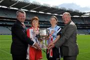 21 September 2010; Competing captains gathered at Croke Park ahead of the TG4 Ladies Football All Ireland finals. The Senior, Intermediate and Junior Championship finals will take place at Croke Park on Sunday 26th of September. Pictured is Pól Ó Gallchóir, Ceannasai, TG4, left, and Pat Quill, President Cumann Peil Gael na mBan, with Senior captains Sinead McLaughlin, Tyrone, left, and Denise Masterson, Dublin. Picture credit: Brian Lawless / SPORTSFILE
