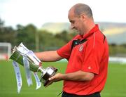22 September 2010; Sligo Rovers and Monaghan United host a joint Media Day ahead of their EA SPORTS Cup final on Saturday September 25th. Sligo Rovers manager Paul Cook is pictured with the EA Sports League Cup. EA SPORTS Cup Final media day, The Showgrounds, Sligo. Picture credit: David Maher / SPORTSFILE