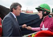 27 July 2016; Donagh Meyler in conversation with Eddie O'Leary of Gigginstown House Stud after winning the TheTote.com Galway Plate Steeplechase Handicap at the Galway Races in Ballybrit, Co Galway. Photo by Cody Glenn/Sportsfile