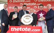 27 July 2016; The President of Ireland Michael D. Higgins with jockey Donagh Meyler, trainer Gordon Elliott, second from left, Eddie O'Leary, third from left, Gigginstown House Stud, and winning connections after winning the TheTote.com Galway Plate Steeplechase Handicap at the Galway Races in Ballybrit, Co Galway. Photo by Cody Glenn/Sportsfile