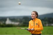 27 July 2016; Niamh Bellew, aged 12, daughter of Antrim manager Ollie Bellew shows off her hurling skills ahead of the Bord Gais Energy Ulster GAA Hurling U21 Championship Final match between Derry and Antrim at Loughgiel Shamrocks GAA Club in Belfast. Photo by David Fitzgerald/Sportsfile
