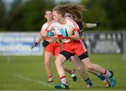 27 July 2016; Clare McCartney of Derry in action against Niamh Brady of Longford during the All Ireland Ladies Football U16 ‘C’ Championship Final 2016 match between Derry and Longford at Fr. Hackett Park in Augher, Co Tyrone. Photo by Oliver McVeigh/Sportsfile