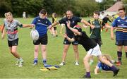 27 July 2016; Coach Niall Kane, centre, takes part in a drill during a Leinster Rugby School of Excellence Camp at King's Hospital in Liffey Valley, Dublin. Photo by Sam Barnes/Sportsfile