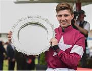 27 July 2016; Donagh Meyler celebrates with the Galway Plate after winning the TheTote.com Galway Plate Steeplechase Handicap on Lord Scoundrel at the Galway Races in Ballybrit, Co Galway. Photo by Cody Glenn/Sportsfile