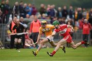 27 July 2016; Saul McCauughan of Antrim in action against Paul McNeill of Derry during the Bord Gais Energy Ulster GAA Hurling U21 Championship Final match between Derry and Antrim at Loughgiel Shamrocks GAA Club in Belfast. Photo by David Fitzgerald/Sportsfile