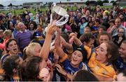 27 July 2016; Roisín Daly of Tipperary, centre, and team mates celebrate with the cup following the All Ireland Ladies Football U16 ‘B’ Championship Final 2016 match between Louth and Tipperary at Edenderry GAA Club in Edenderry, Co Offaly. Photo by Sam Barnes/Sportsfile