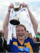 27 July 2016; Longford captain Orla Farrell holds the cup aloft following victory in the All Ireland Ladies Football U16 ‘C’ Championship Final 2016 match between Derry and Longford at Fr. Hackett Park in Augher, Co Tyrone. Photo by Oliver McVeigh/Sportsfile
