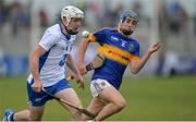 27 July 2016; Shane Bennett of Waterford  in action against Paul Maher of Tipperary  during the Bord Gáis Energy Munster GAA Hurling U21 Championship Final match between Waterford and Tipperary at Walsh Park in Waterford. Photo by Eóin Noonan/Sportsfile