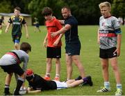 27 July 2016; Coach Niall Kane takes part in a drill during a Leinster Rugby School of Excellence Camp at King's Hospital in Liffey Valley, Dublin. Photo by Sam Barnes/Sportsfile