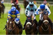 28 July 2016; Eventual winner Scamall Dubh, left, with Mark Enright up, races ahead of Taglietelle, centre, with Jack Kennedy up, and Dont Tell No One, right, with Davy Russell up, on their way to winning the Guinness Dublin Porter Beginners Steeplechase at the Galway Races in Ballybrit, Co Galway. Photo by Cody Glenn/Sportsfile