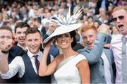 28 July 2016; Lisa McGowan, from Tullamore, Co Offaly, who was named best dressed lady, pictured with racegoers at the Galway Races in Ballybrit, Co Galway. Photo by Cody Glenn/Sportsfile