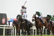 28 July 2016; Ruby Walsh celebrates winning the Guinness Galway Hurdle Handicap on Clondaw Warrior in front of Hidden Cyclone, with Danny Mullins up, second from right, and the rest of the field at the Galway Races in Ballybrit, Co Galway. Photo by Cody Glenn/Sportsfile