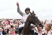28 July 2016; Ruby Walsh celebrates as he enters the winner's enclosure on Clondaw Warrior after winning the Guinness Galway Hurdle Handicap at the Galway Races in Ballybrit, Co Galway. Photo by Cody Glenn/Sportsfile