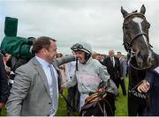 28 July 2016; Ruby Walsh celebrates with Michael &quot;Chips&quot; Gannon in the winner's enclosure after winning the Guinness Galway Hurdle Handicap on Clondaw Warrior at the Galway Races in Ballybrit, Co Galway. Photo by Cody Glenn/Sportsfile