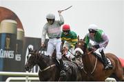 28 July 2016; Ruby Walsh celebrates winning the Guinness Galway Hurdle Handicap on Clondaw Warrior in front of Hidden Cyclone, with Danny Mullins up, right, who finished second, and Princely Conn, with Rachael Blackmore up, who finished third, at the Galway Races in Ballybrit, Co Galway. Photo by Cody Glenn/Sportsfile