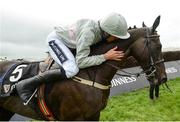 28 July 2016; Ruby Walsh kisses Clondaw Warrior after winning the Guinness Galway Hurdle Handicap at the Galway Races in Ballybrit, Co Galway. Photo by Cody Glenn/Sportsfile