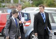 22 September 2010; Leinster player Sean O’Brien, centre, accompanied by his legal representative Derek Hegarty, left, and Leinster team manager Guy Easterby arriving for the Irish Rugby Football Union Disciplinary Panel hearing to consider a citing complaint against O’Brien from the Benetton Treviso v Leinster Magners League game on Saturday, 18th September 2010. IRFU Disciplinary Panel Meeting, Ravenhill Park, Belfast, Co. Antrim. Picture credit: Oliver McVeigh / SPORTSFILE