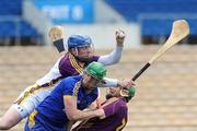 2 May 2010; Wexford goalkeeper Noel Carton collects the ball ahead of team-mate Keith Rossiter and Diarmuid McMahon, Clare. Allianz GAA Hurling National League Division 2 Final, Clare v Wexford, Semple Stadium, Thurles, Co Tipperary. Picture credit: Daire Brennan / SPORTSFILE