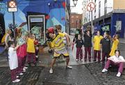 23 September 2010; Irish freestyle soccer player Dan Dennehy with pupils, from James Street CBS, at the launch of the new sports brand Pele Sports. Pelé Sports launch, Temple Bar, Dublin. Picture credit: Matt Browne / SPORTSFILE