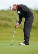 24 September 2010; Philip Walton putts for a 3 on the 6th green. Ladbrokes.com Irish PGA Championship, Seapoint Golf Club, Co. Louth. Photo by Sportsfile