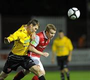 24 September 2010; Daniel North, St Patrick's Athletic, in action against Garry Breen, Dundalk. Airtricity League Premier Division, St Patrick's Athletic v Dundalk, Richmond Park, Inchicore, Dublin. Picture credit: Matt Browne / SPORTSFILE