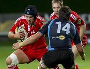 24 September 2010; Niall Ronan, Munster, holds off DTH Van Der Merwe, Glasgow Warriors. Celtic League, Glasgow Warriors v Munster, Firhill Stadium, Glasgow, Scotland. Picture credit: Alan Harvey / SPORTSFILE