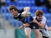 25 September 2010; Peter Lydon, Leinster, is tackled by Nicholas Mawhinney, Ulster. U19 Schools Interprovincial (Blues), Leinster v Ulster, Donnybrook Stadium, Dublin. Picture credit: Matt Browne / SPORTSFILE