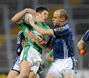 25 September 2010; Tomas McCanne, Erins Own GAC Cargin, in action against Aodhan Gallagher, St Galls. Antrim County Senior Football Championship Final, Erins Own GAC Cargin v St Galls, Casement Park, Belfast, Co. Antrim. Picture credit: Oliver McVeigh / SPORTSFILE