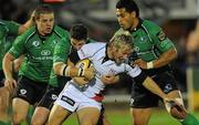 25 September 2010; Jamie Smith, Ulster, is tackled by Keith Matthews, left, and Niva Ta'auso, Connacht. Celtic League, Connacht v Ulster, Sportsground, Galway. Picture credit: Diarmuid Greene / SPORTSFILE