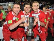 25 September 2010; Sligo Rovers players, from left to right, Iarflaith Davoran, John Russell and Alan Keane celebrate with the EA Sports Cup after the match. EA Sports Cup Final, Sligo Rovers v Monaghan United, The Showgrounds, Sligo. Picture credit: Barry Cregg / SPORTSFILE