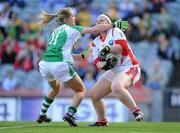 26 September 2010; Louth goalkeeper Caoimhe Breen is tackled by Maire Flanagan, Limerick. TG4 All-Ireland Junior Ladies Football Championship Final, Louth v Limerick, Croke Park, Dublin. Picture credit: Brendan Moran / SPORTSFILE