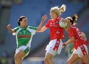 26 September 2010; Kate Flood, Louth, in action against Maggie O'Brien, Limerick. TG4 All-Ireland Junior Ladies Football Championship Final, Louth v Limerick, Croke Park, Dublin. Picture credit: Ray McManus / SPORTSFILE