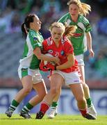 26 September 2010; Maria Reid, Louth, in action against Maggie O'Brien, left, and Sandra Larkin, Limerick. TG4 All-Ireland Junior Ladies Football Championship Final, Louth v Limerick, Croke Park, Dublin. Picture credit: Ray McManus / SPORTSFILE