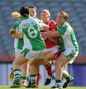 26 September 2010; Aine McGee, Louth, in action against Emma McGuire, right, Yvette Moynihan, 6, and Paula Donnelly, Limerick. TG4 All-Ireland Junior Ladies Football Championship Final, Louth v Limerick, Croke Park, Dublin. Picture credit: Ray McManus / SPORTSFILE