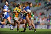 26 September 2010; Sinead Ryan, Waterford, in action against Kelly Wilson, left, and Aoife McDonnell, Donegal. TG4 All-Ireland Intermediate Ladies Football Championship Final, Donegal v Waterford, Croke Park, Dublin. Picture credit: Brendan Moran / SPORTSFILE